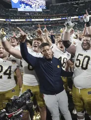 Marcus Freeman becomes first Asian American to coach a college football championship game